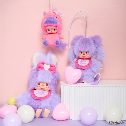 Three colorful plush toys with pastel colors on a pink background