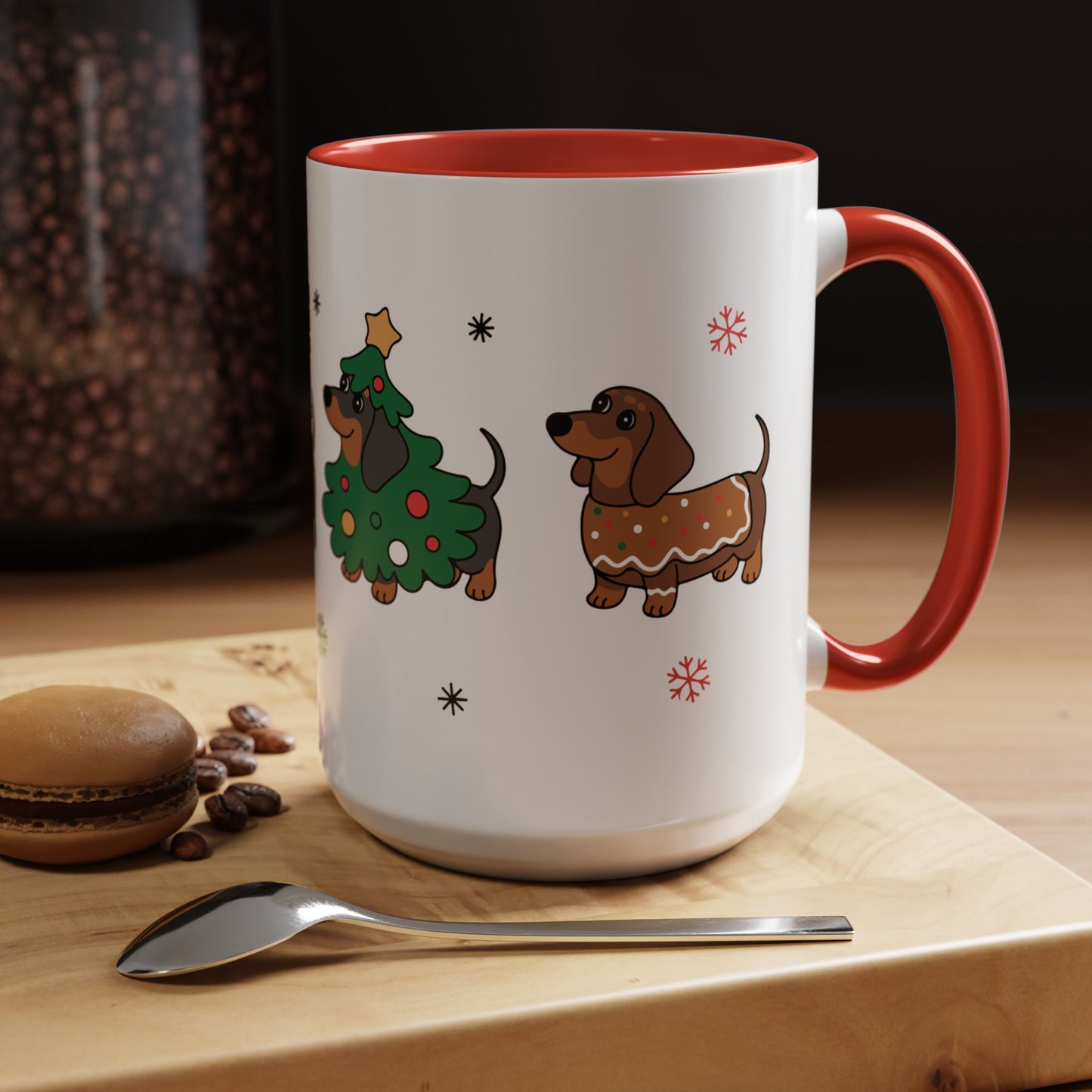 White mug with red interior and handle, featuring Christmas-themed dachshund illustrations on a wooden surface.
