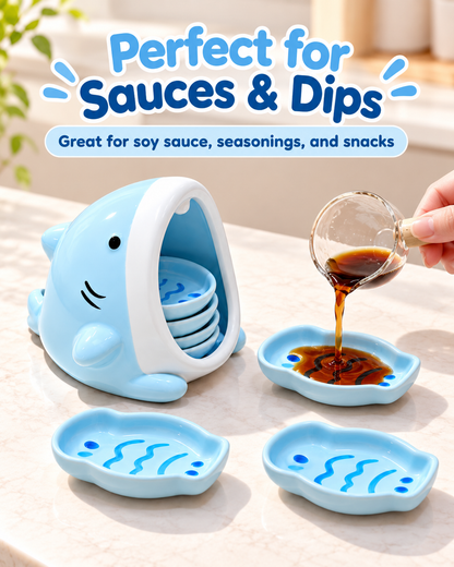 Blue fish-shaped dipping dishes shown with sauce and shark holder