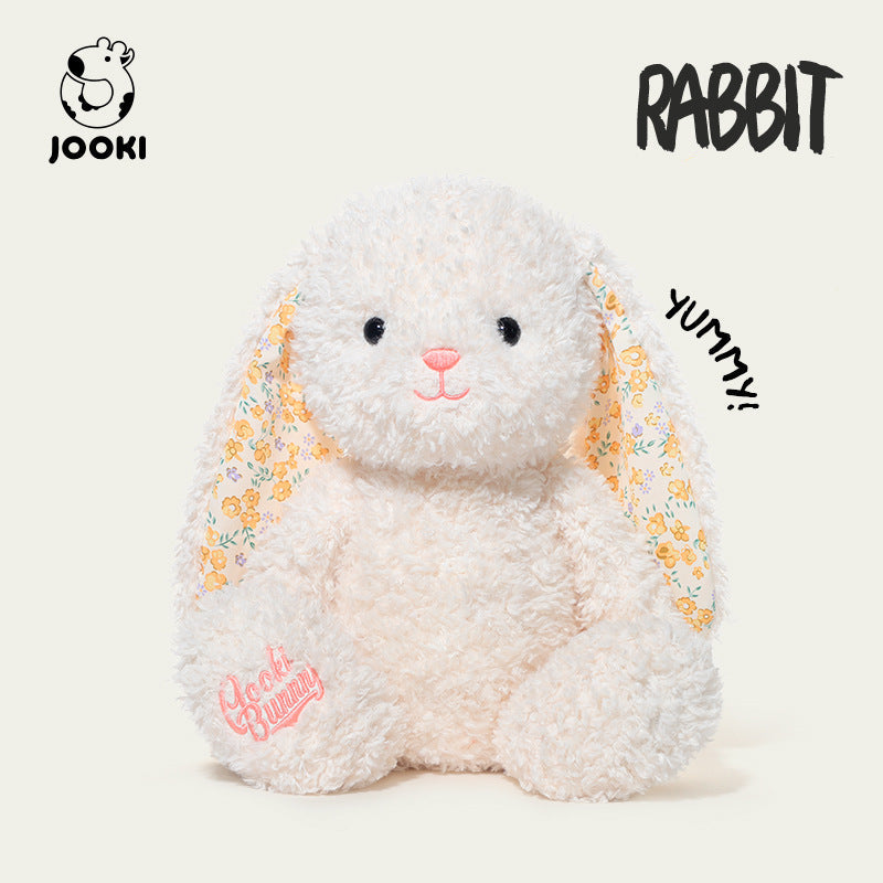 Plush rabbit toy with floral patterns on a white background, featuring the brand 'Jooki'.