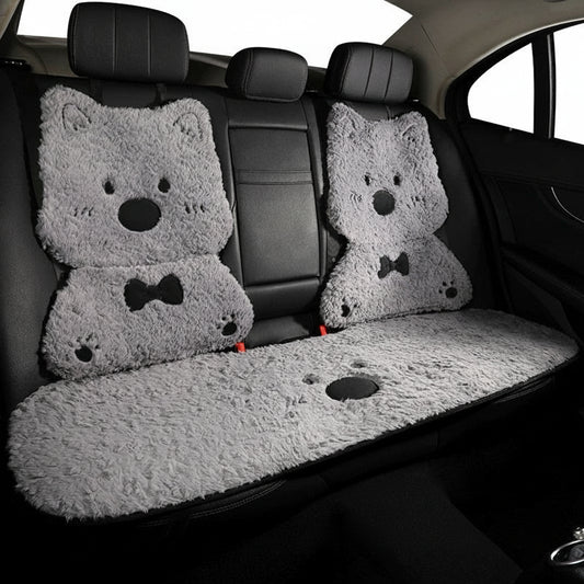 Car seat covers with dog designs in a car interior
