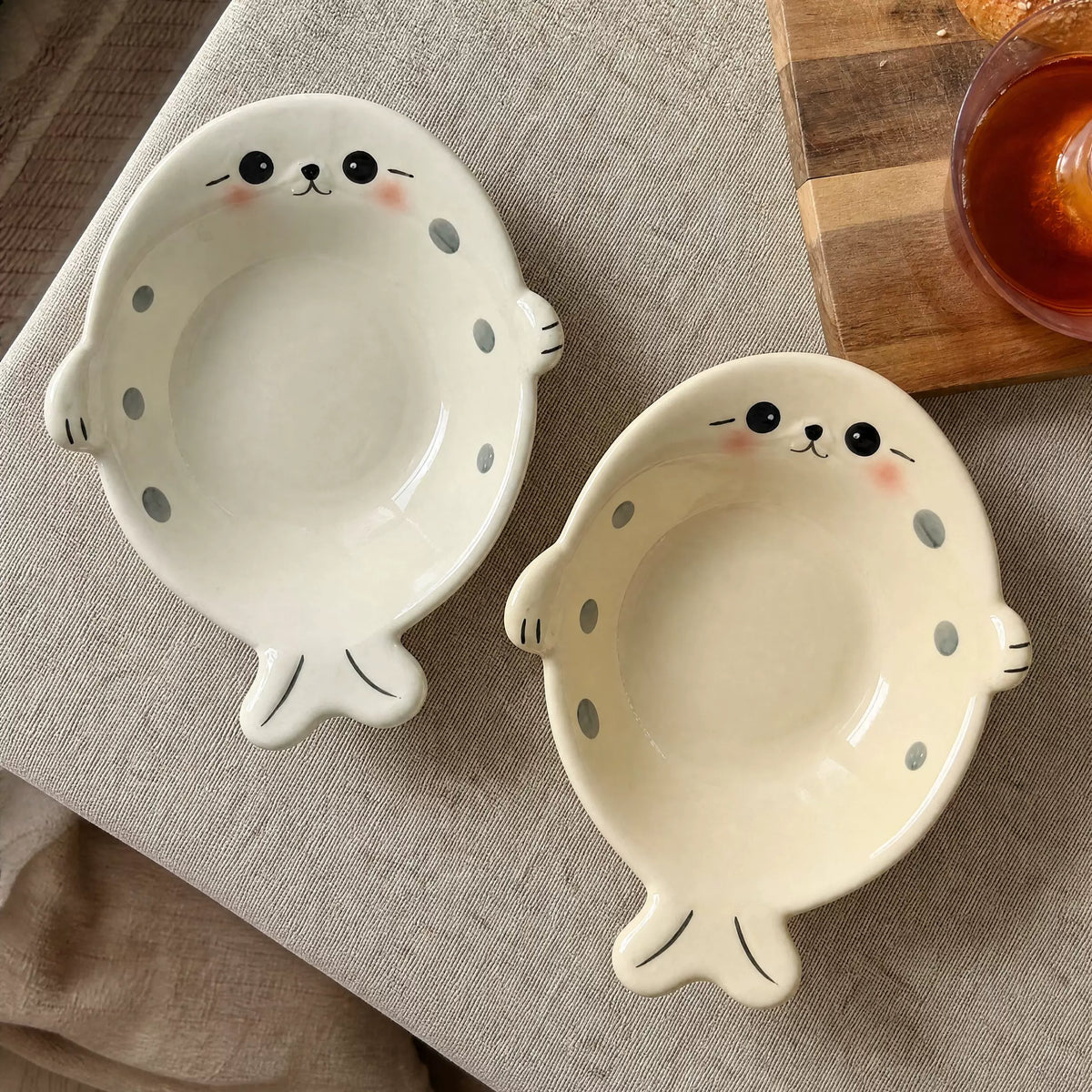 White and cream Chubby Seal ceramic bowl set