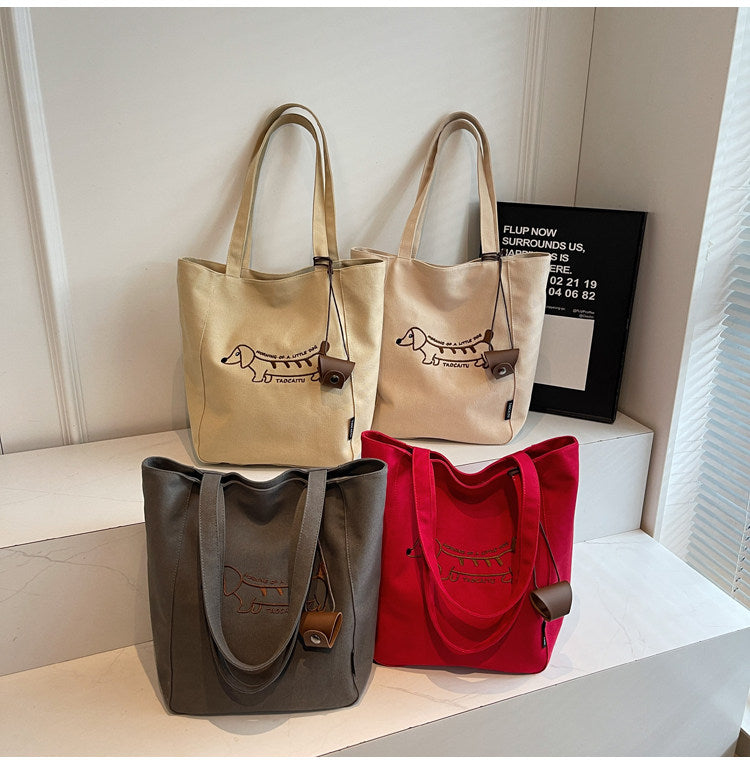 Embroidered dachshund tote bags in beige, khaki, red and dark grey