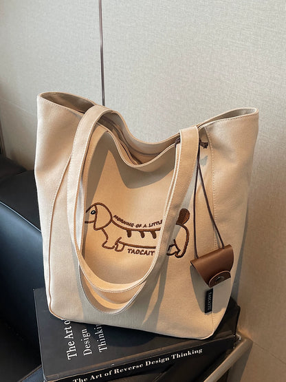 Khaki embroidered dachshund tote bag displayed upright